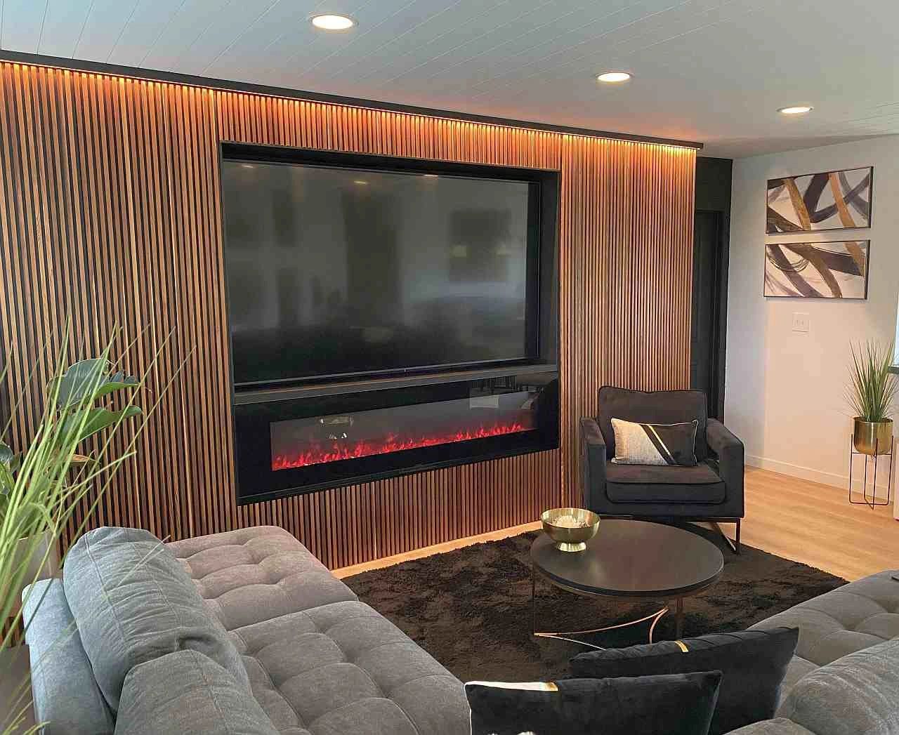 wood feature wall with hidden storage cabinets
