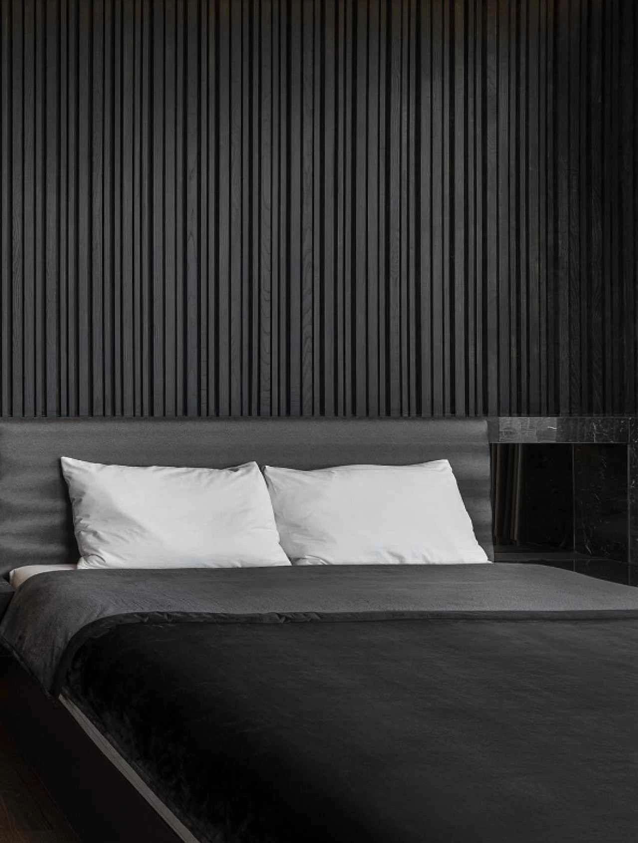 modern black bedroom wood feature wall