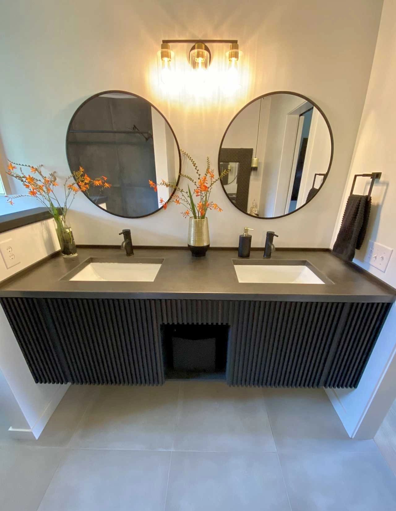 modern, decluttered bathroom with wood floating vanity